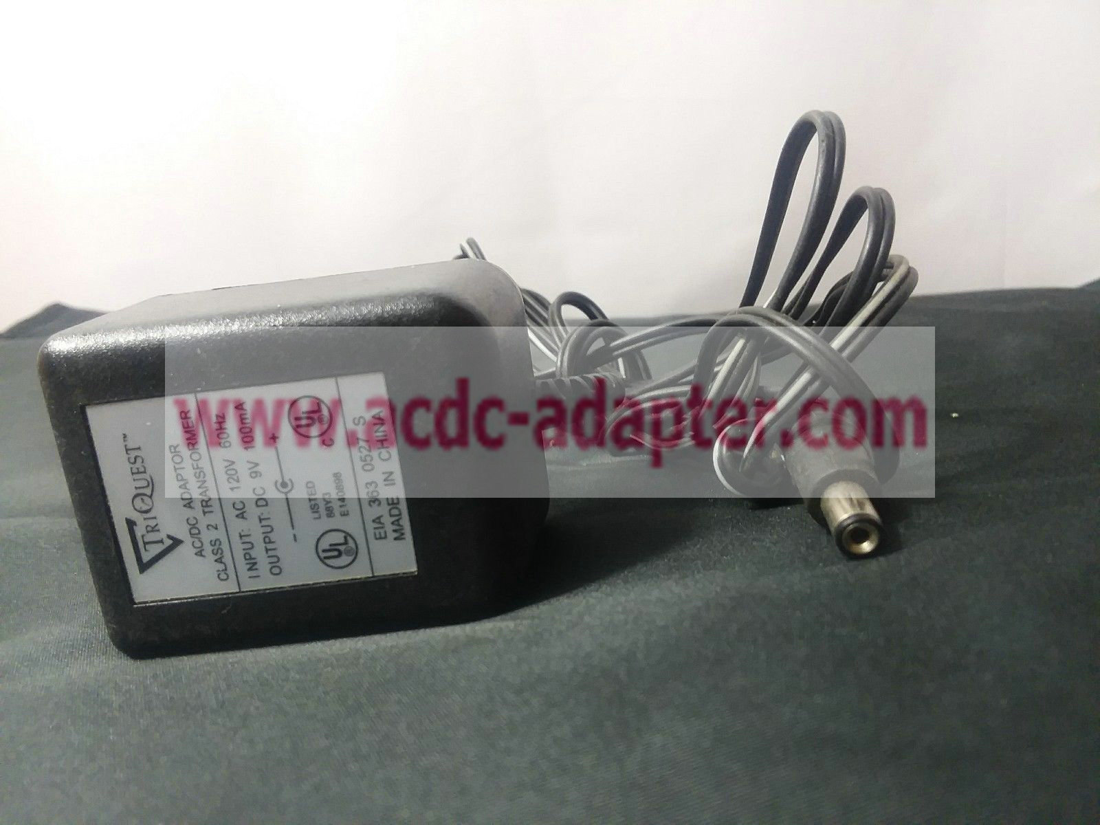 Genuine TRIQUEST E140898 AC 9V DC 100mA AC/DC Adapter 120V 60Hz - Click Image to Close